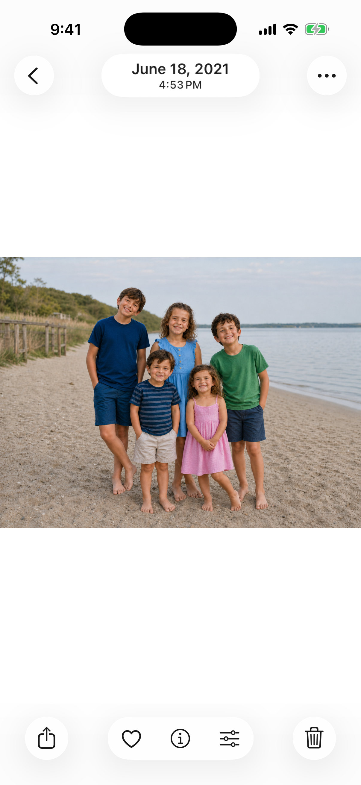 Five cousins standing together in the Photos app, with the photo dated June 18, 2021.